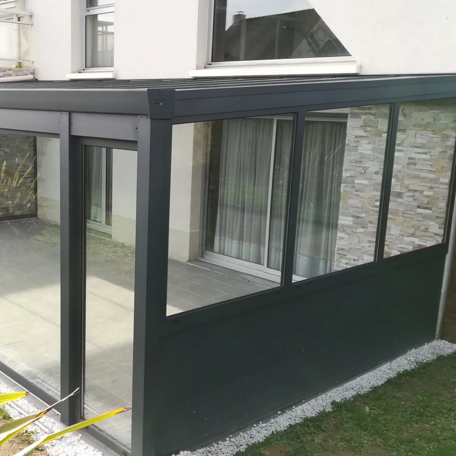 Terrasse avec toiture polycarbonate